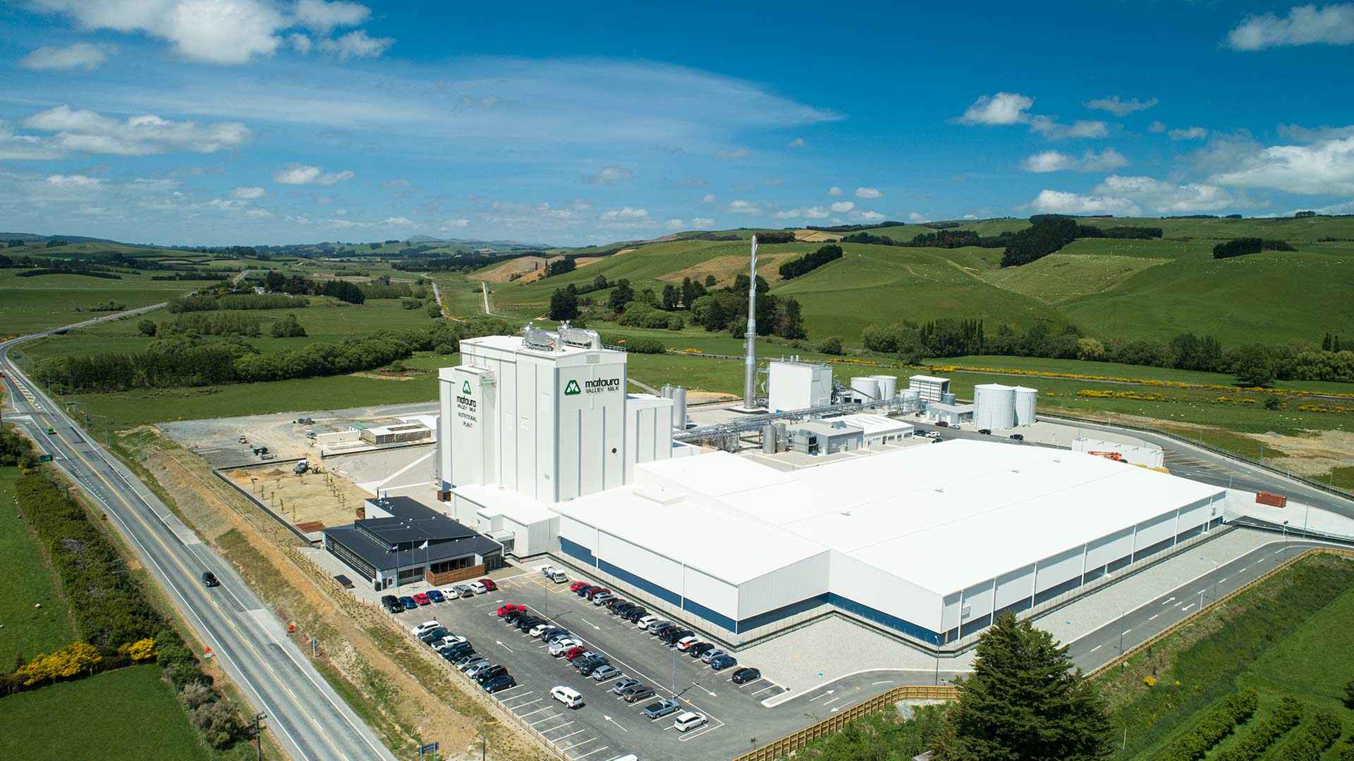 cars parked at the mataura valley milk plant