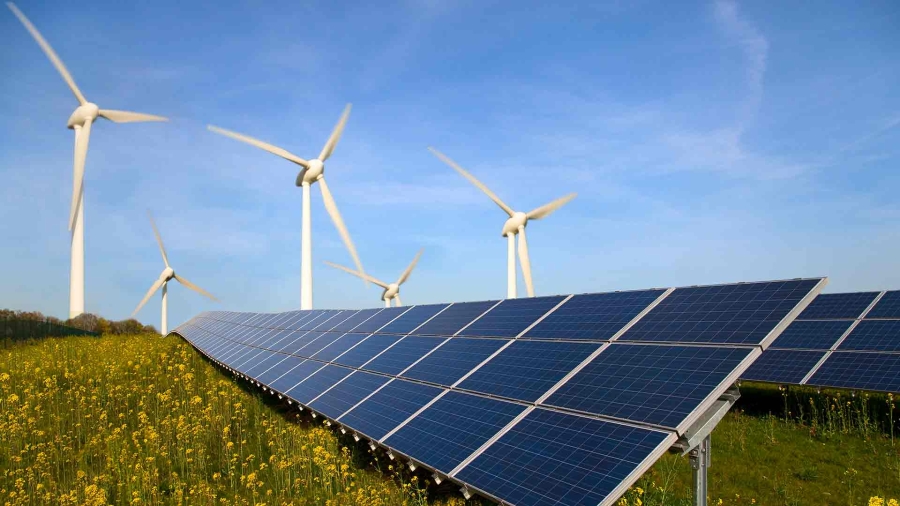 solar panels and wind turbines in a garden