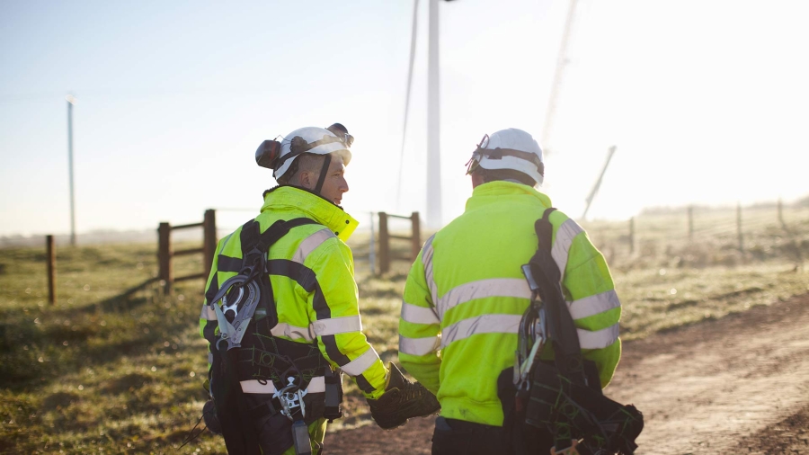 Engineers in protective clothing at a site